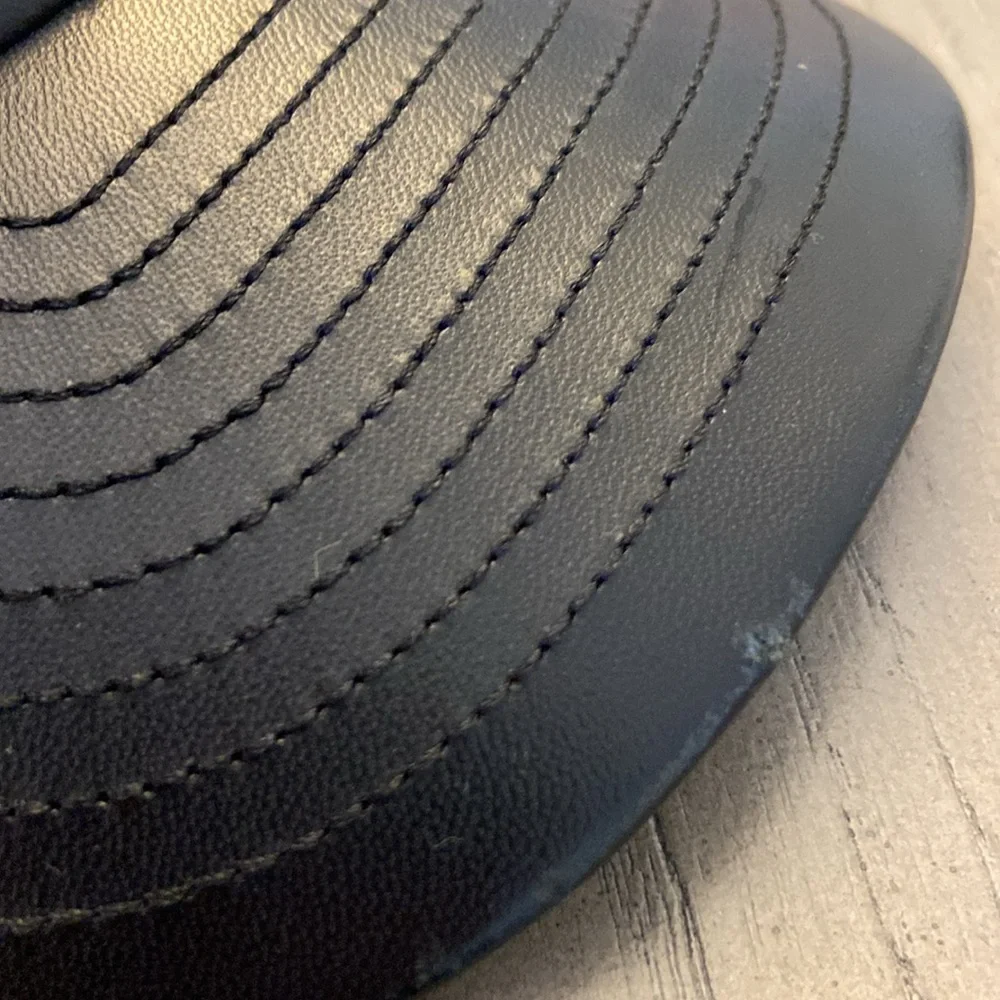 MELIN The Voyage Black Nappa Leather 6 Panel Cap.